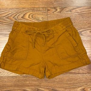 yellow/mustard shorts